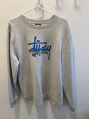 Stussy Men’s Light Gray Crewneck with Blue and Yellow Logo